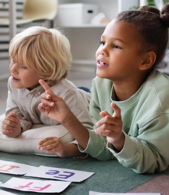 Child smiling during a daycare activity